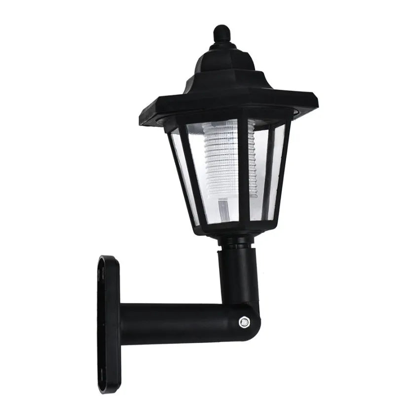Black hexagonal solar wall light for outdoor mounting with automatic light sensor