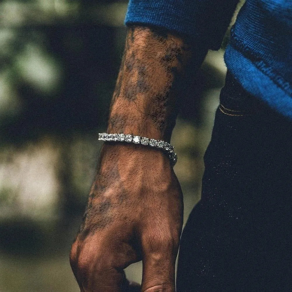 Men's silver alloy Hip Hop bracelet with geometric links, set with a row of clear rhinestone and zirconia charms.
