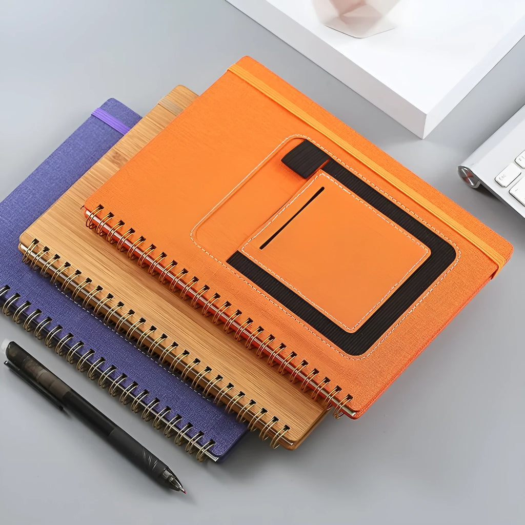 Erasable coil notebook with stone paper pages and customisable cover options including black, blue, and wood grain designs.