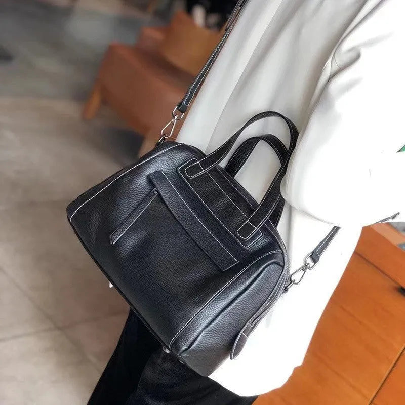 Genuine leather messenger bag with horizontal square shape and litchi pattern sewing detail