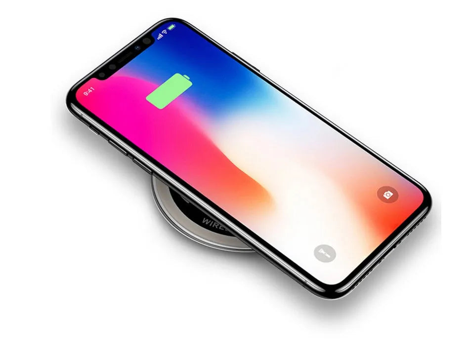 Black desktop embedded Qi wireless charger showing flush installation on a desk surface requiring 60mm hole
