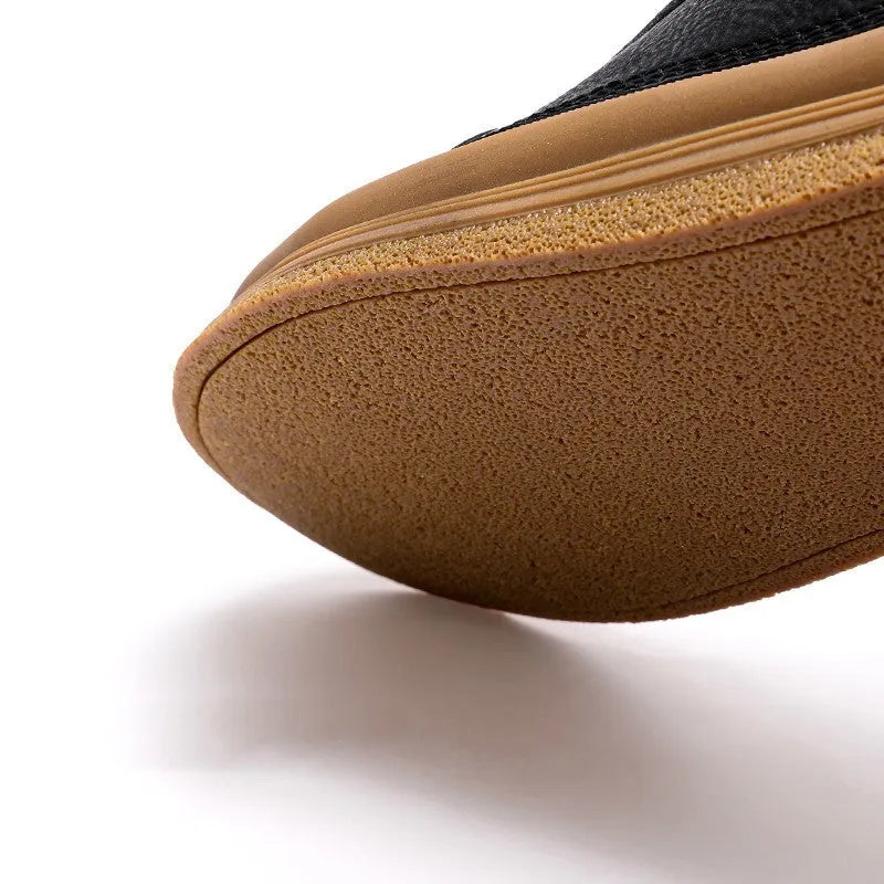 Men's black casual leather shoes with round toe and lace-up closure on white background