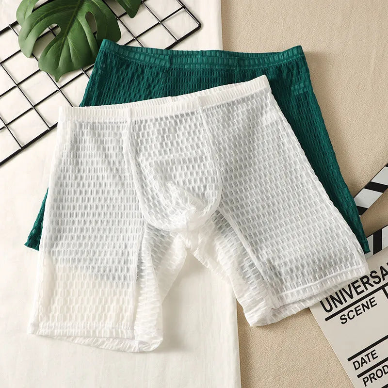 Men's solid colour lace shaping boxer underwear on a neutral background.