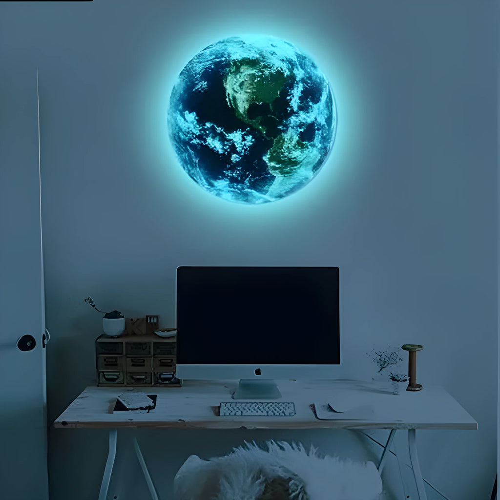 Glow in the dark 3D planet Earth wall sticker in 30cm diameter on a dark blue wall.