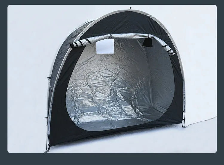 Large black outdoor bicycle storage tent sheltering multiple bikes