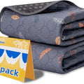 Breathable absorbent machine washable non-slip cloth dog training urine pad in dark grey leaves pattern on floor
