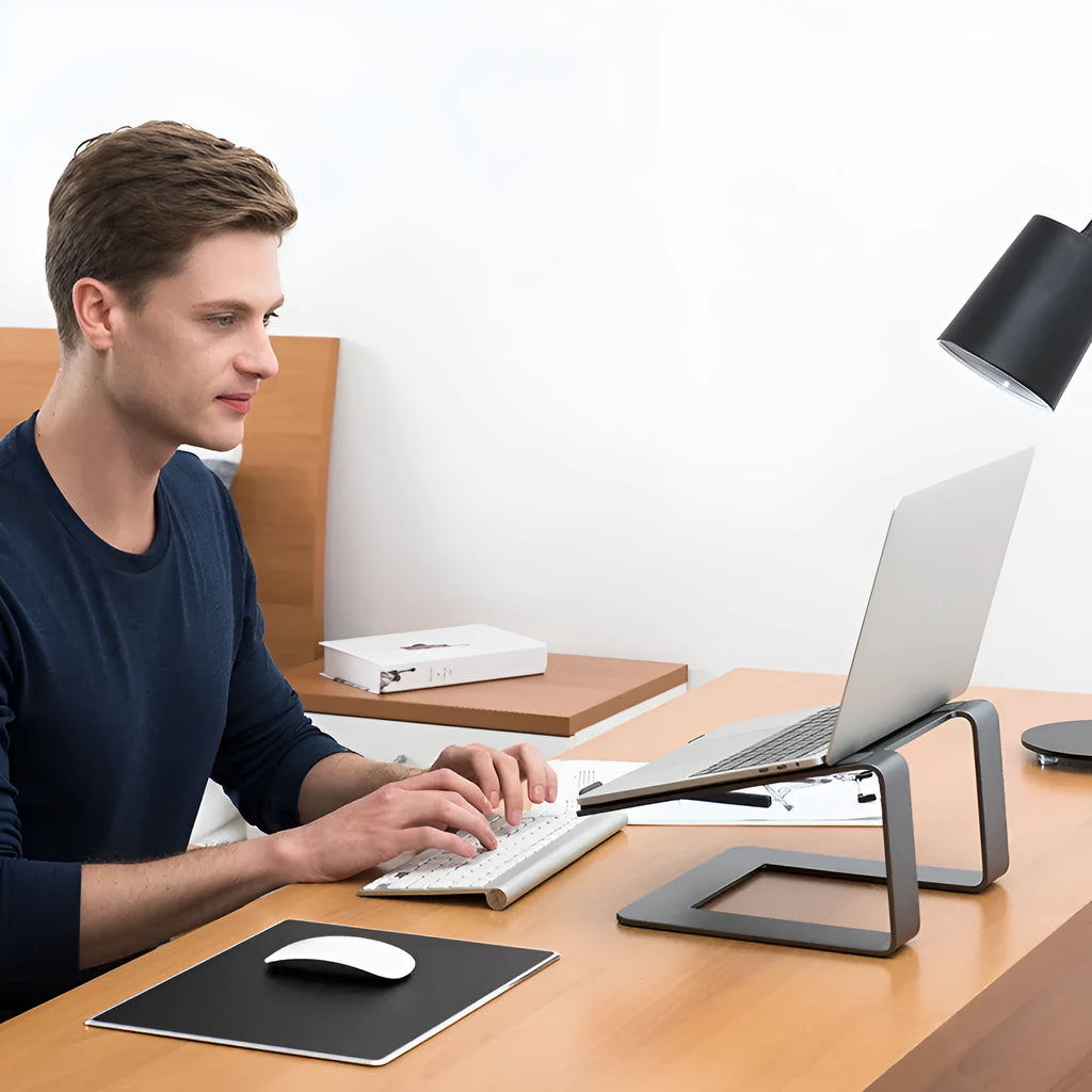 Aluminium laptop stand in black colour showing 29.9cm width and 18.5cm height dimensions