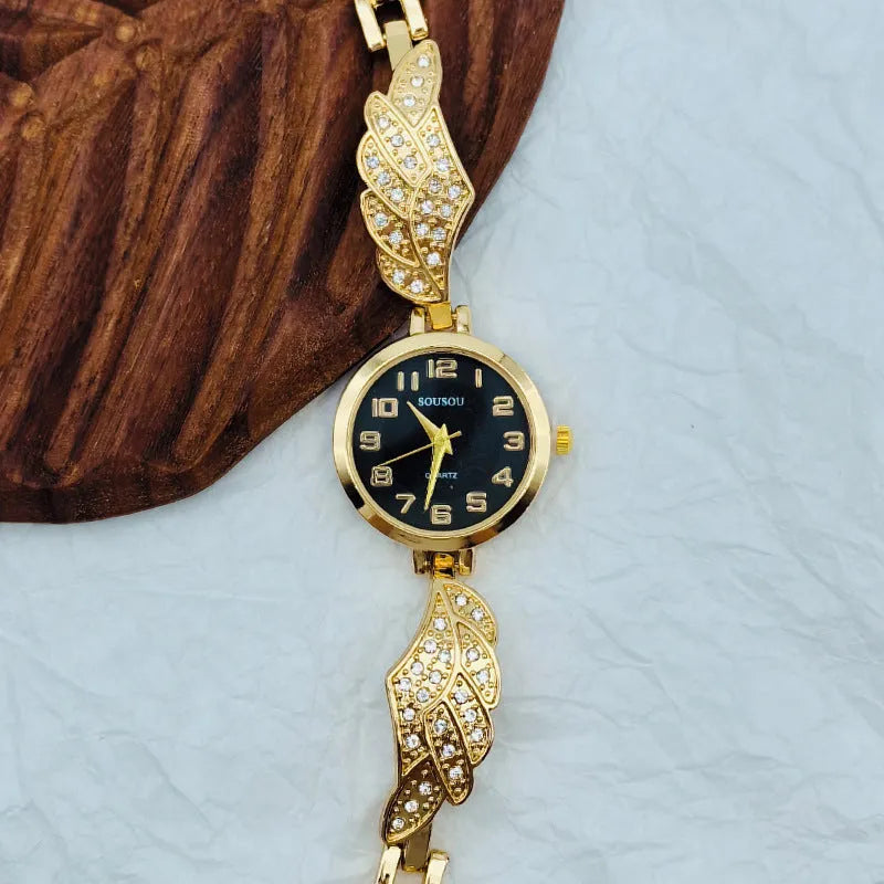 Women's stainless steel watch with a round dial shown in gold, black and gold, and white and gold colour options