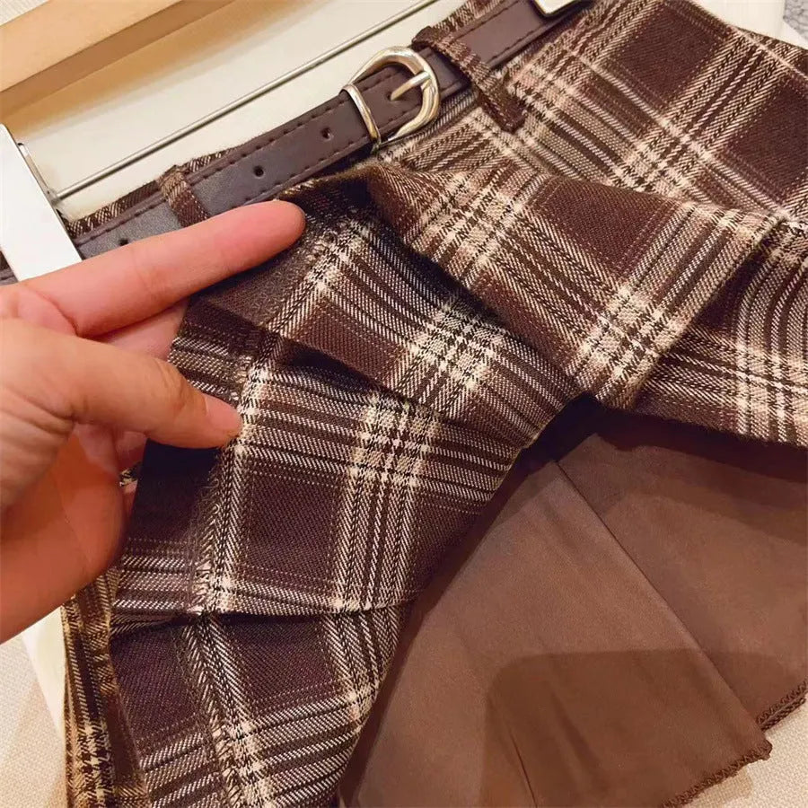 Children's plaid pleated skirt in cotton blend fabric with A-line silhouette available in multiple height options