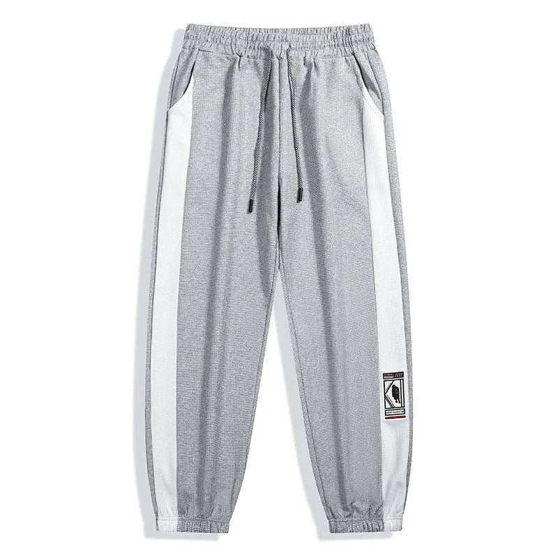 Men's casual wide leg fleece lined trousers in black, loose fit with drawstring waist