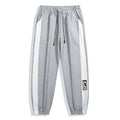 Men's casual wide leg fleece lined trousers in black, loose fit with drawstring waist