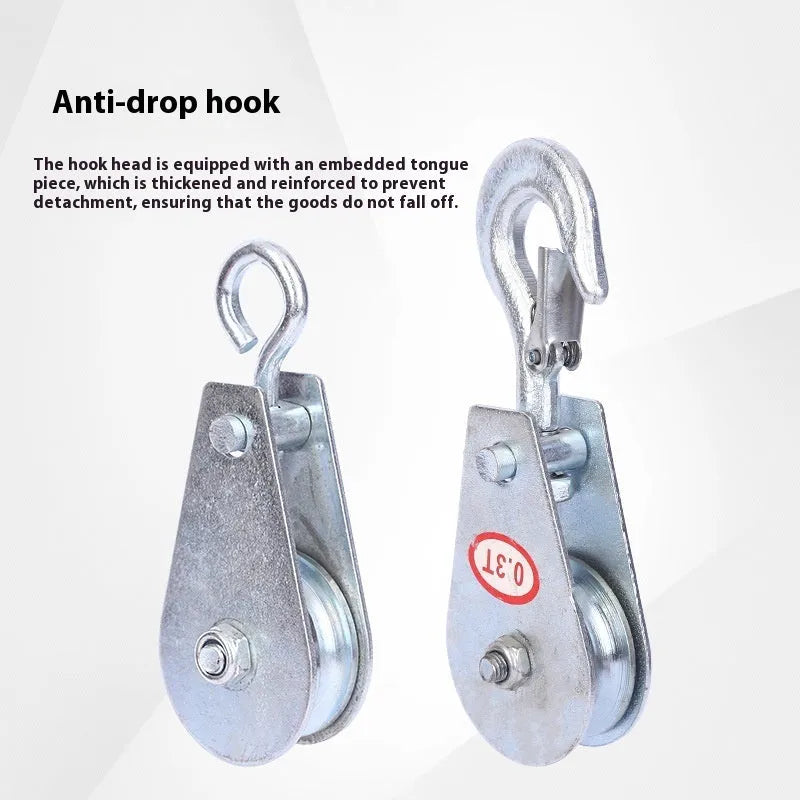 Red steel industrial lifting pulley with a safety latch and large hook opening.