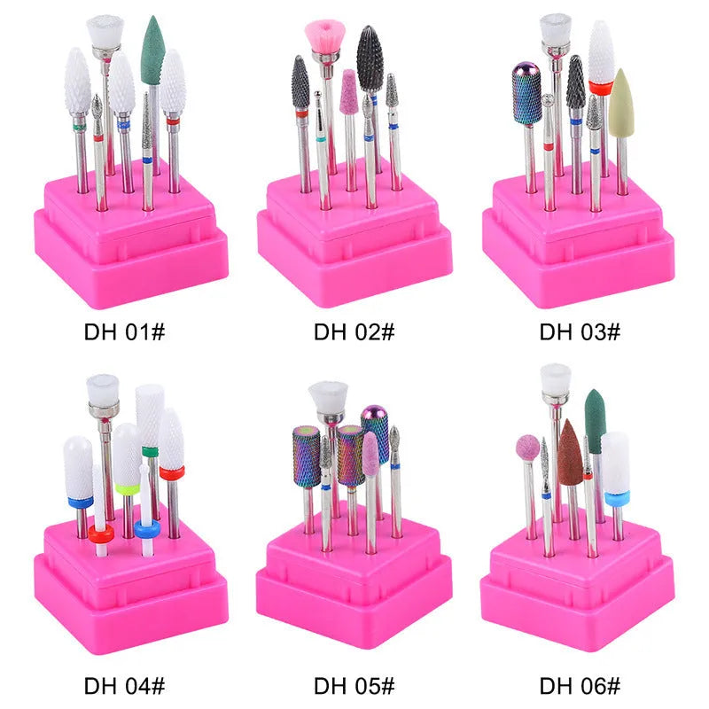 Set of seven tungsten steel nail drill polishing heads and brush in a transparent storage case.