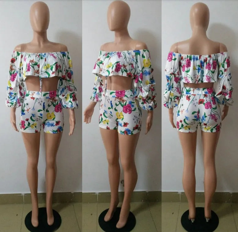 Multicolour digital print two-piece costume with fluffy sleeves and matching shorts.
