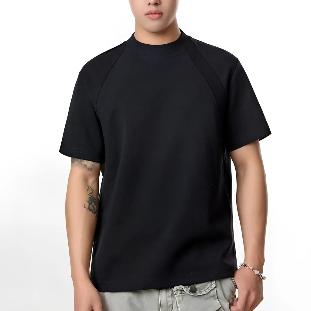 Man's loose grey short sleeve top with textured air layer stitching on the fabric