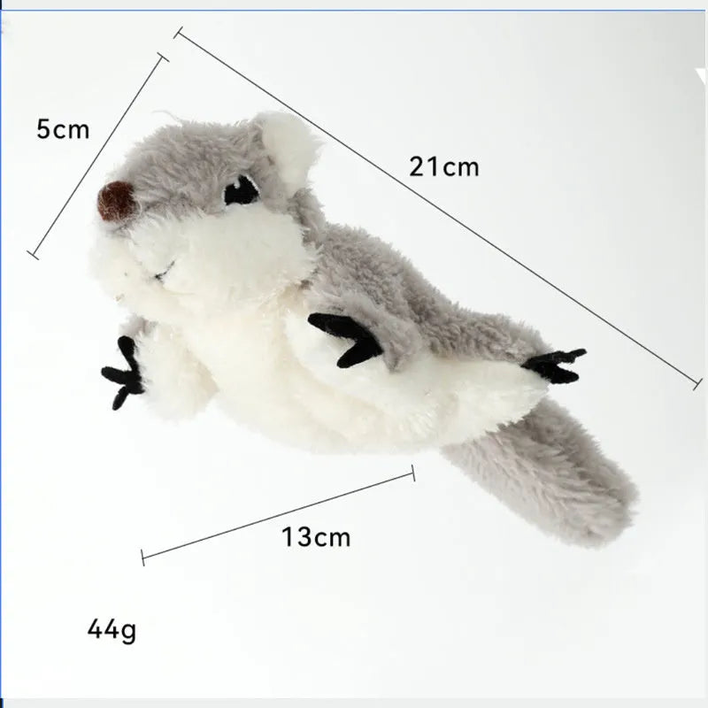 Grey flapping squirrel cat toy with USB charging cable on a plain background.