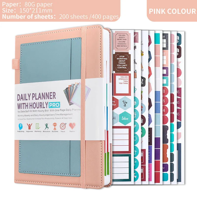 A6 self-filled notebook with PU cover in various colours, shown open on wooden table.