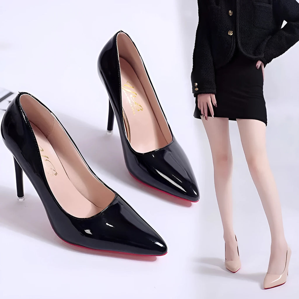 Women's pointed toe stiletto heel pumps in black with shallow mouth opening