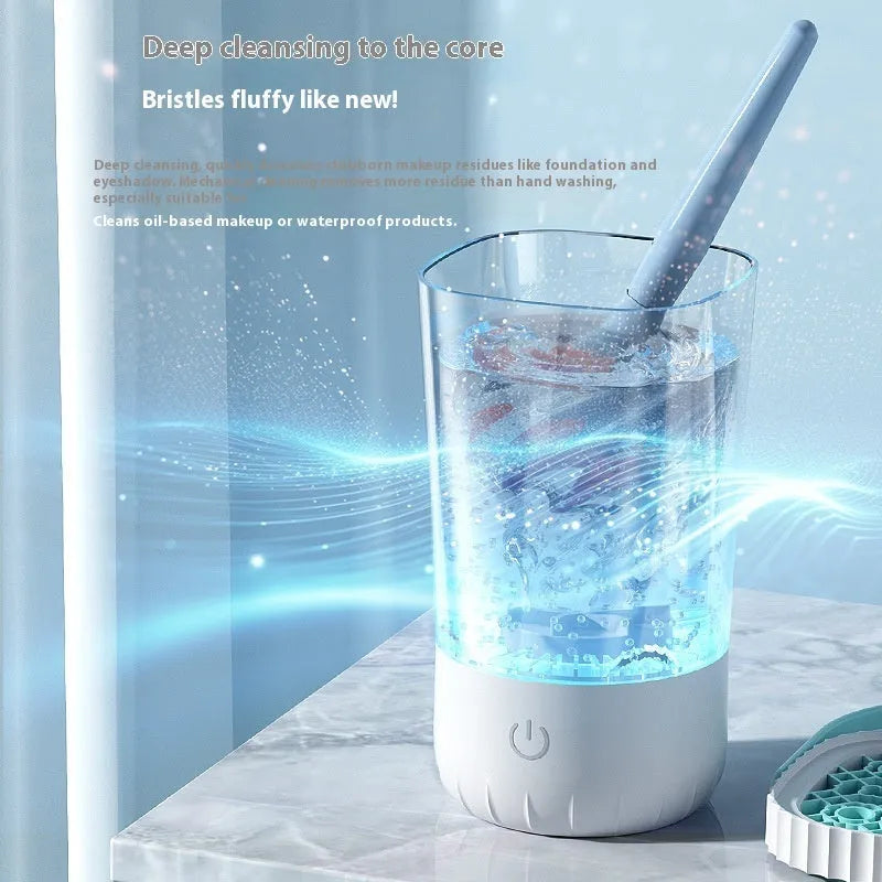 White plastic rechargeable electric makeup brush cleaner with USB cable