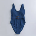 Navy blue women's one-piece triangle swimsuit with removable chest pads for swimming