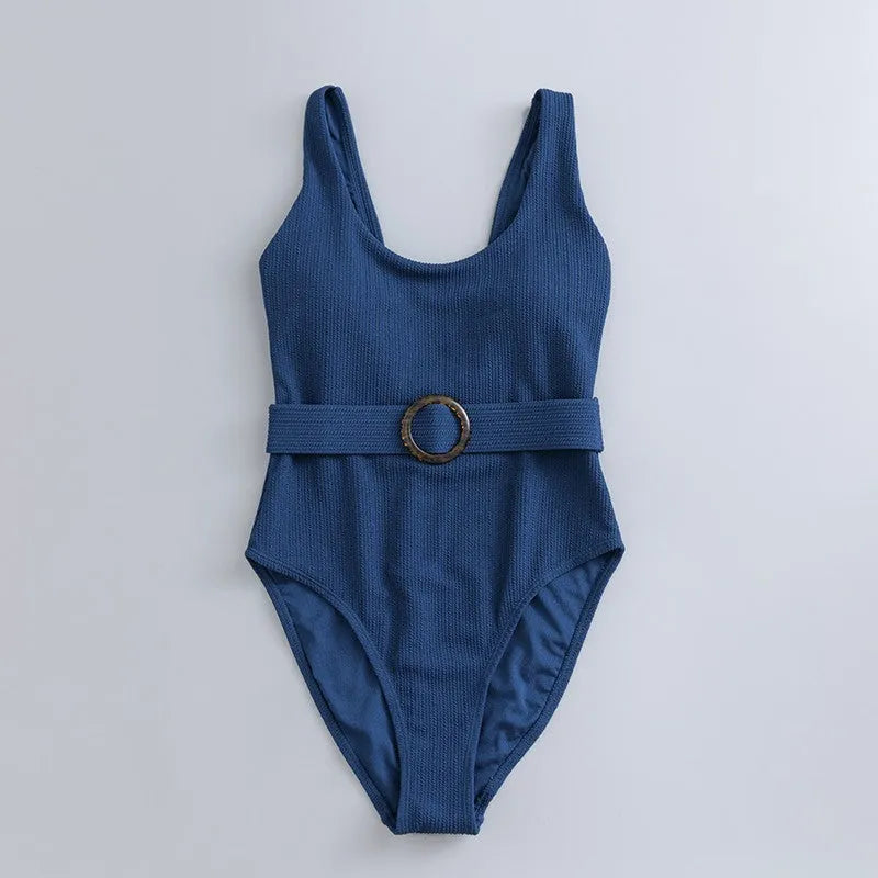 Navy blue women's one-piece triangle swimsuit with removable chest pads for swimming