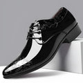 Men's glossy black patent leather formal shoes with pointed toe and carved detail, low top style