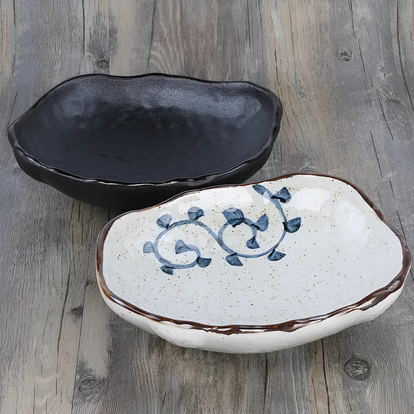 Creative Japanese style coarse pottery sashimi bowl with irregular shape and floral decoration