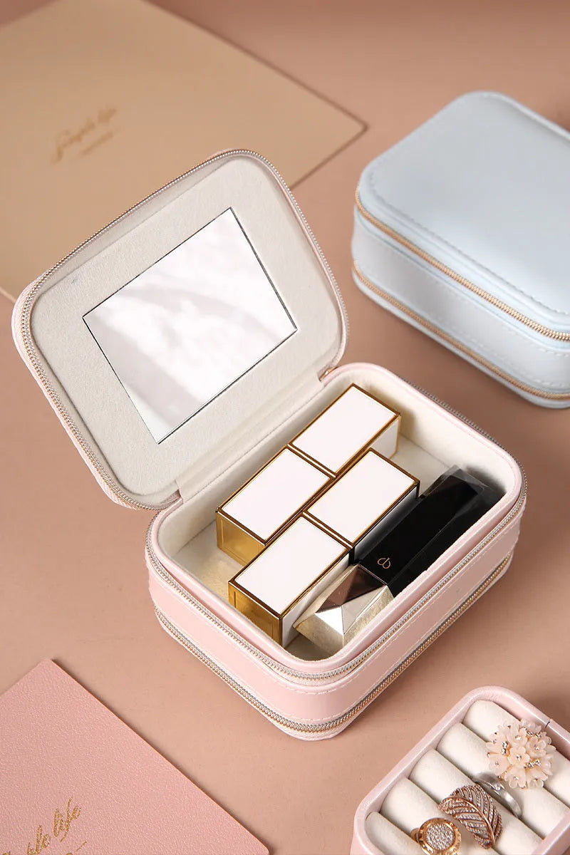 Portable double-sided travel jewellery box in blue with PU leather exterior and pearl velvet lining