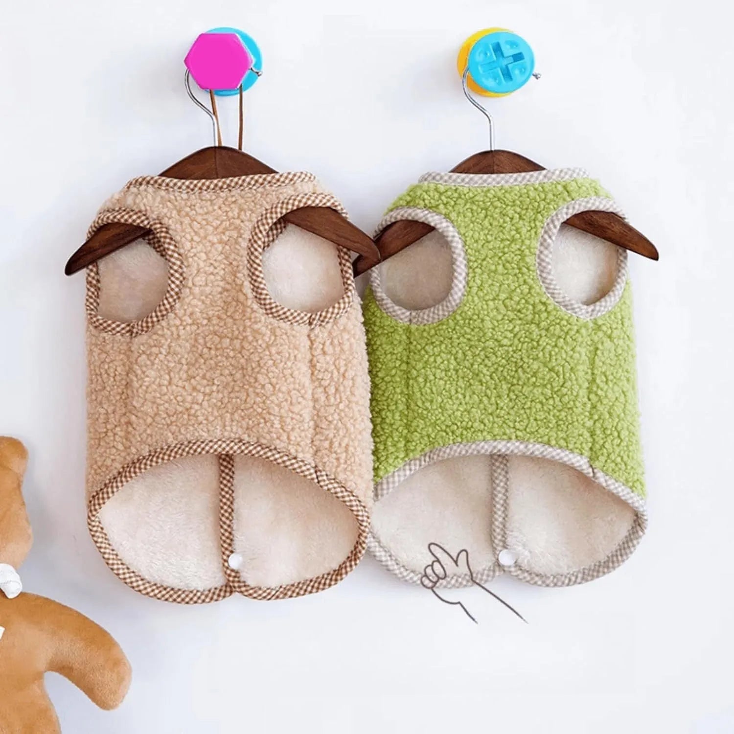 Green coral fleece dog vest with a metal leash ring on the back for a small dog