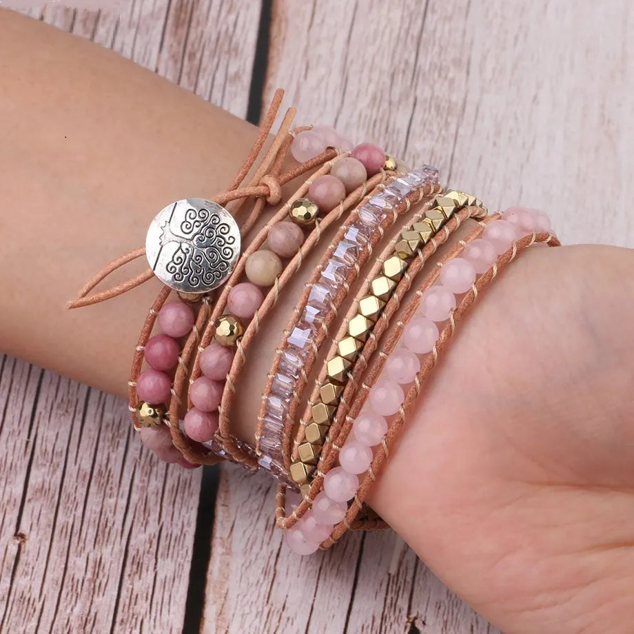 5 strand rose quartz leather wrap bracelet on wrist showing boho style gemstone beads