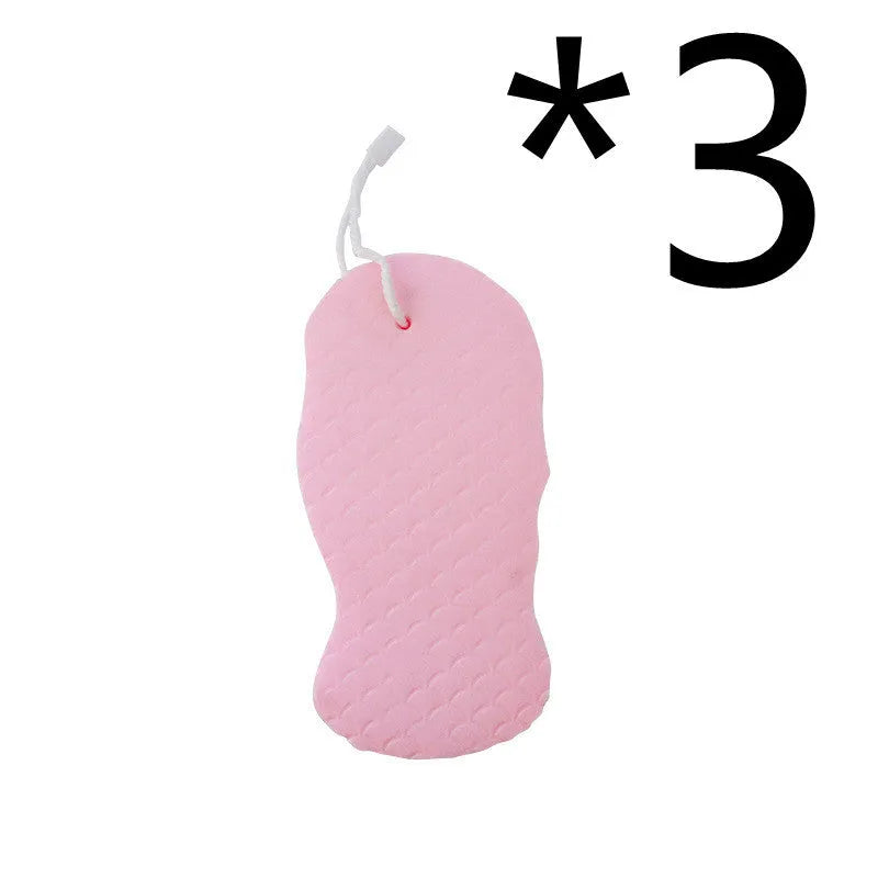 3D fish scale pattern bath sponge ball in assorted colours on a bathroom background.