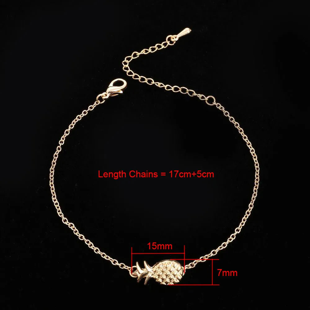 Women's gold or silver tone alloy bracelet with a pineapple charm.