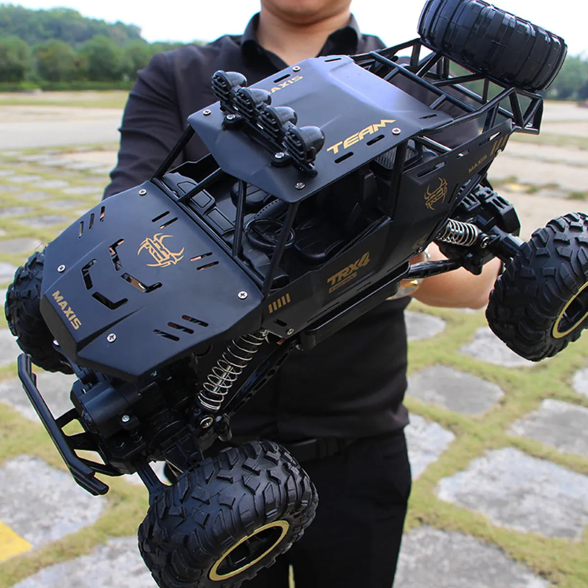 Large black 4WD off-road remote control climbing car with 2.4G wireless remote