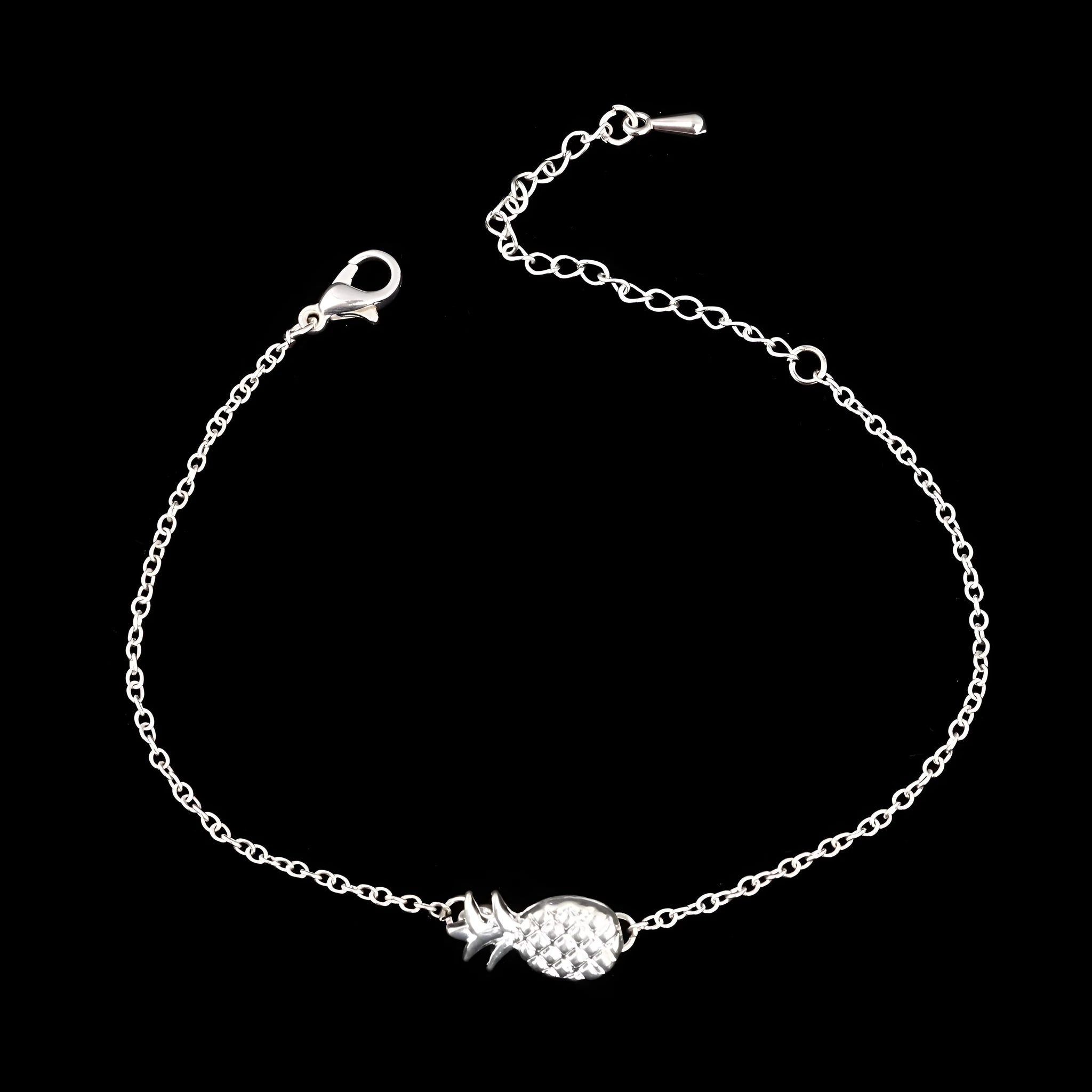 Women's gold or silver tone alloy bracelet with a pineapple charm.