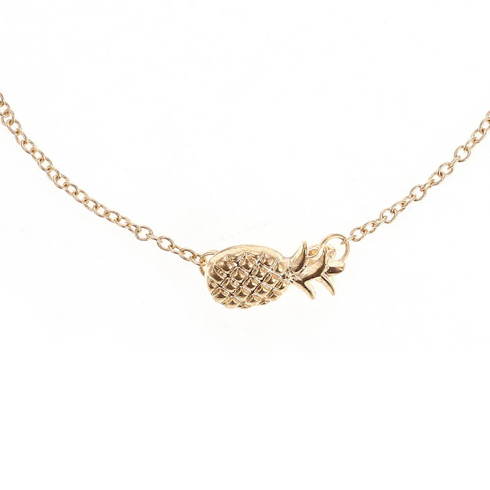 Women's gold or silver tone alloy bracelet with a pineapple charm.