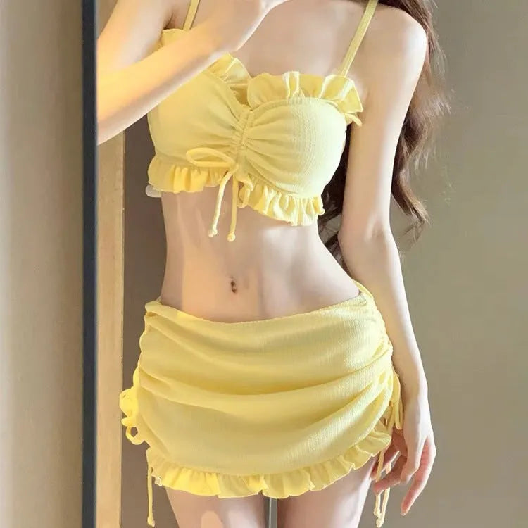 Women's solid colour milk silk bikini swimsuit for swimming, showing top and pants.