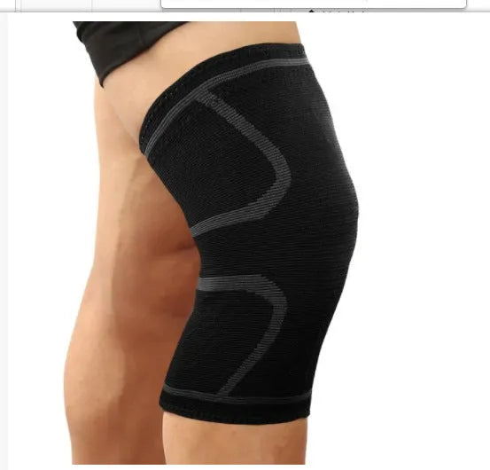 A pair of black double corrugated non-slip stretch sports kneecaps for knee protection.