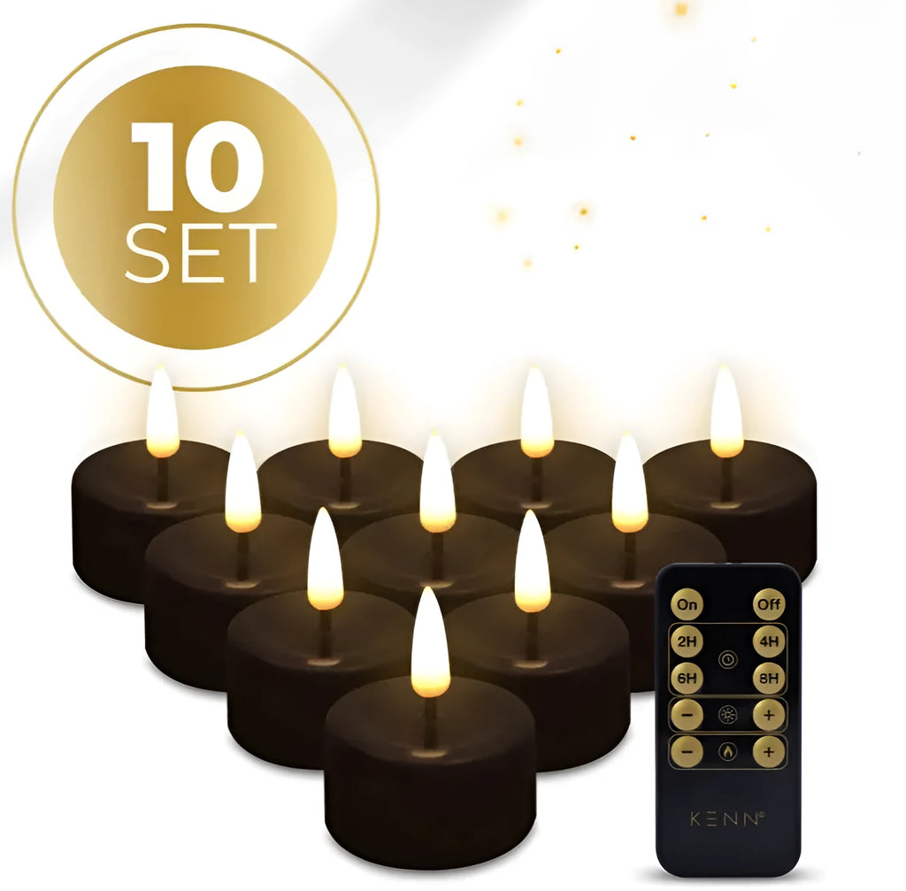 Set of four black S10 LED flameless tealight candles with flickering light, shown from the side.