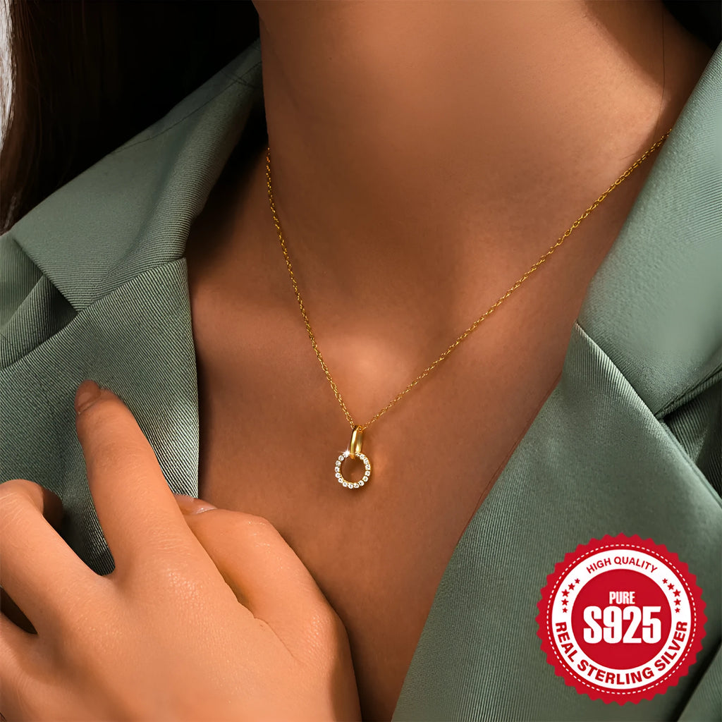 Gold colour S925 sterling silver necklace with geometric interlocking pendant containing micro inlaid zircon stones