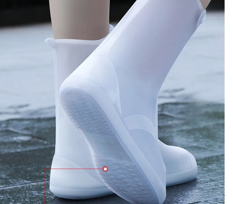 White PVC high top reusable women's water resistant shoe covers showing anti-skid sole and high cylinder design