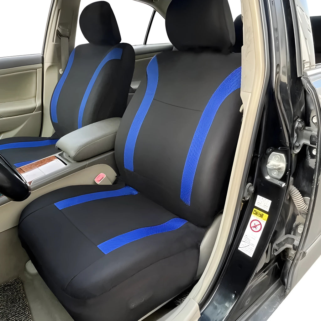 Set of blue polyester car seat covers with eyelet stitching on a vehicle seat.