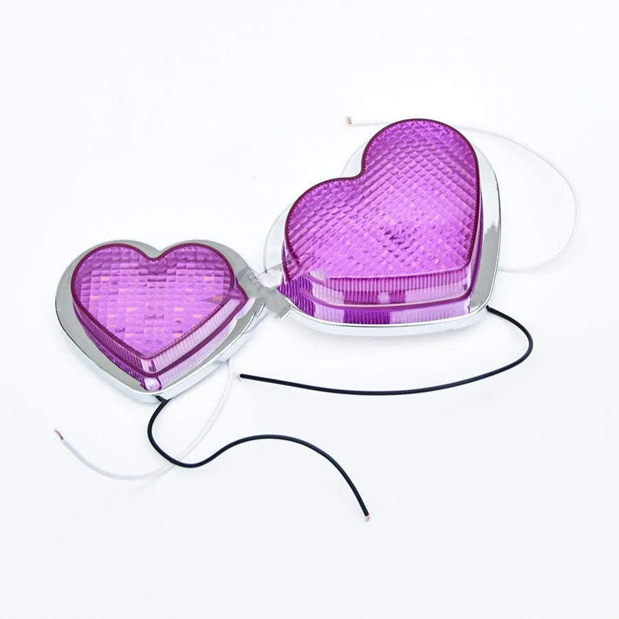 12V heart-shaped red LED automotive sidelight for fender mounting on a car.
