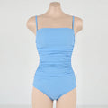 Sling style belly pleated one-piece swimsuit in solid color nylon and spandex blend for spring bathing
