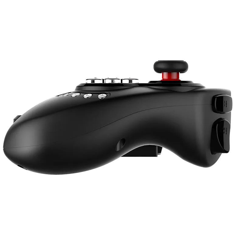 PG-9023 wireless telescopic gamepad controller holding a mobile phone