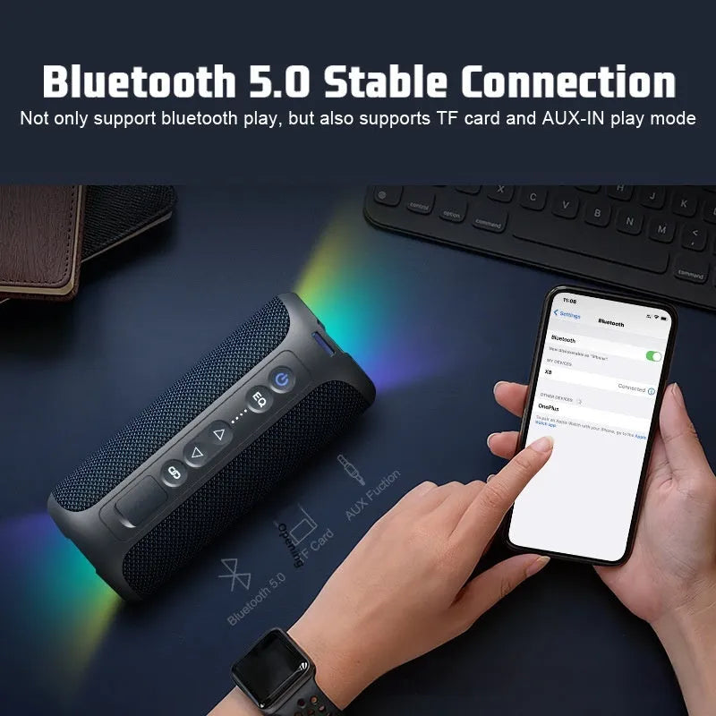 Black and blue fabric wireless Bluetooth speaker with 40W power and built-in lighting effects.