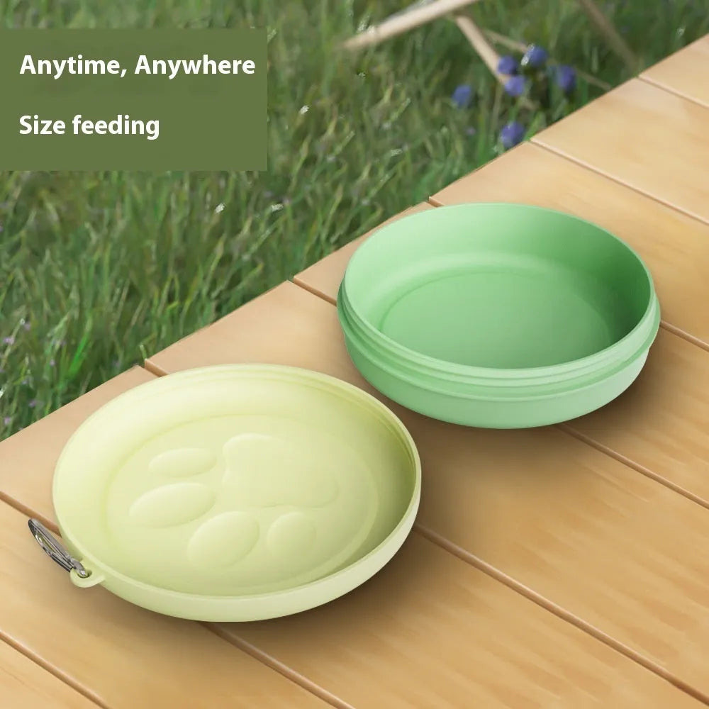 Collapsible silicone dog bowl shown in expanded feeding position and folded flat storage position
