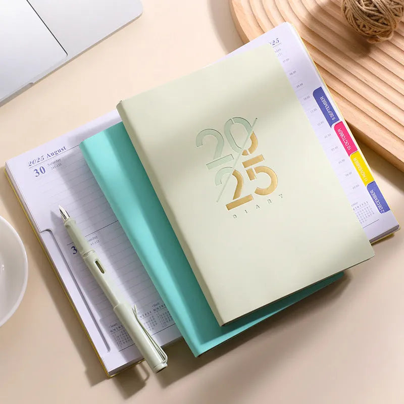 Soft leather A5 daily planner with 150 sheets open on desk showing Dorian paper and binding