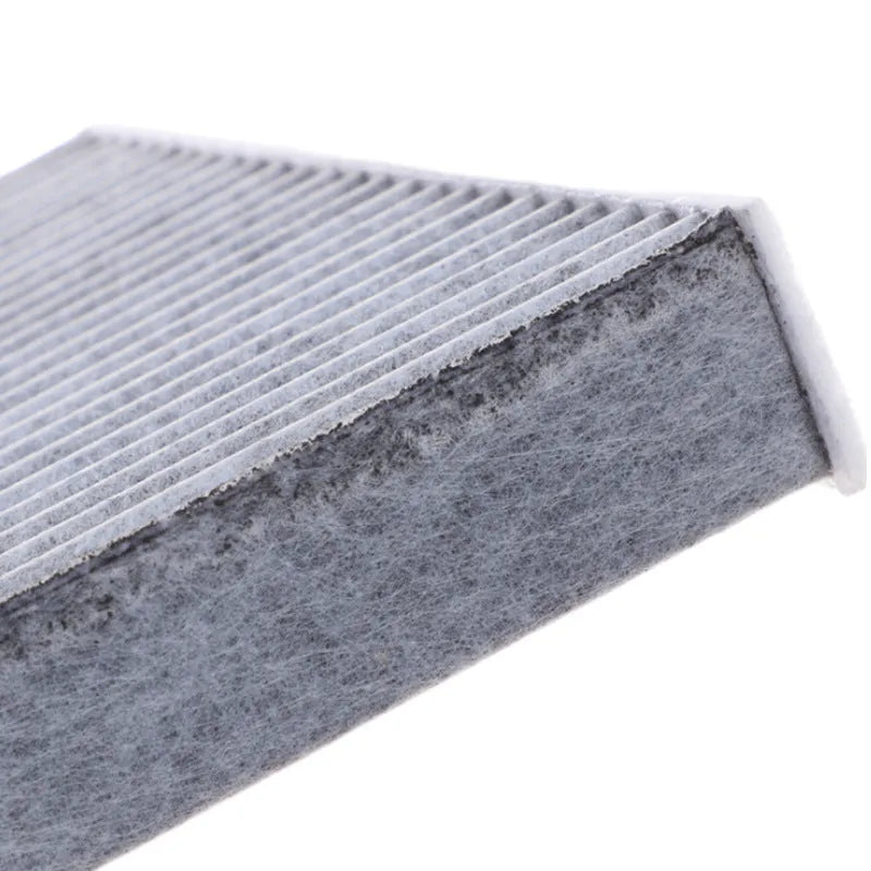 Grey air conditioning filter element for Geely vehicles measuring 215x210x30mm