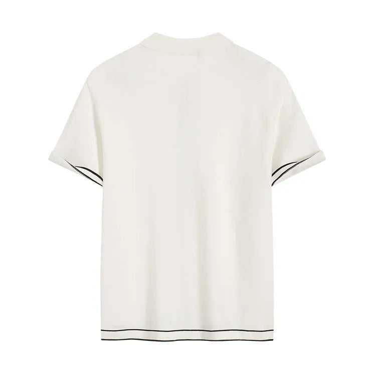 White short sleeve cardigan with dark contrast lapels, showing front view.