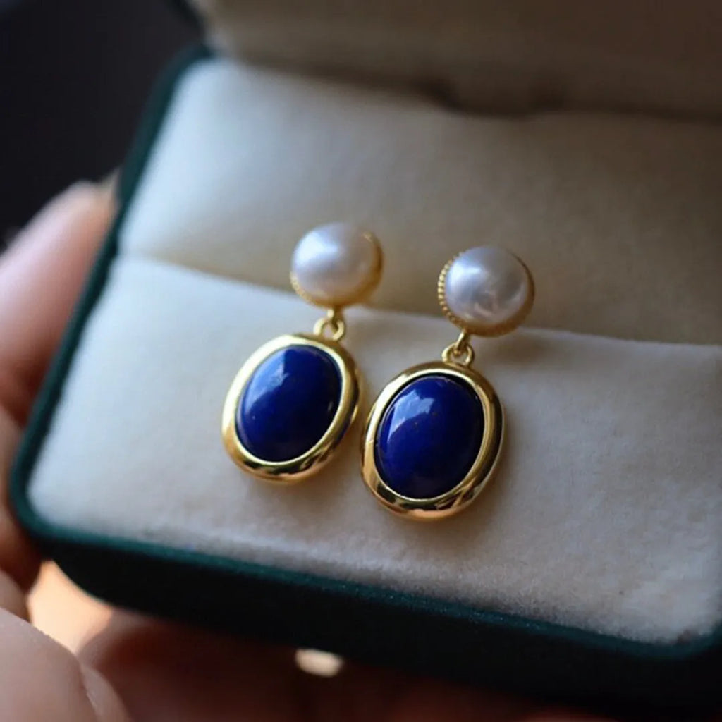 A pair of simple lapis lazuli pearl dangle earrings in 925 sterling silver with auspicious patterns.